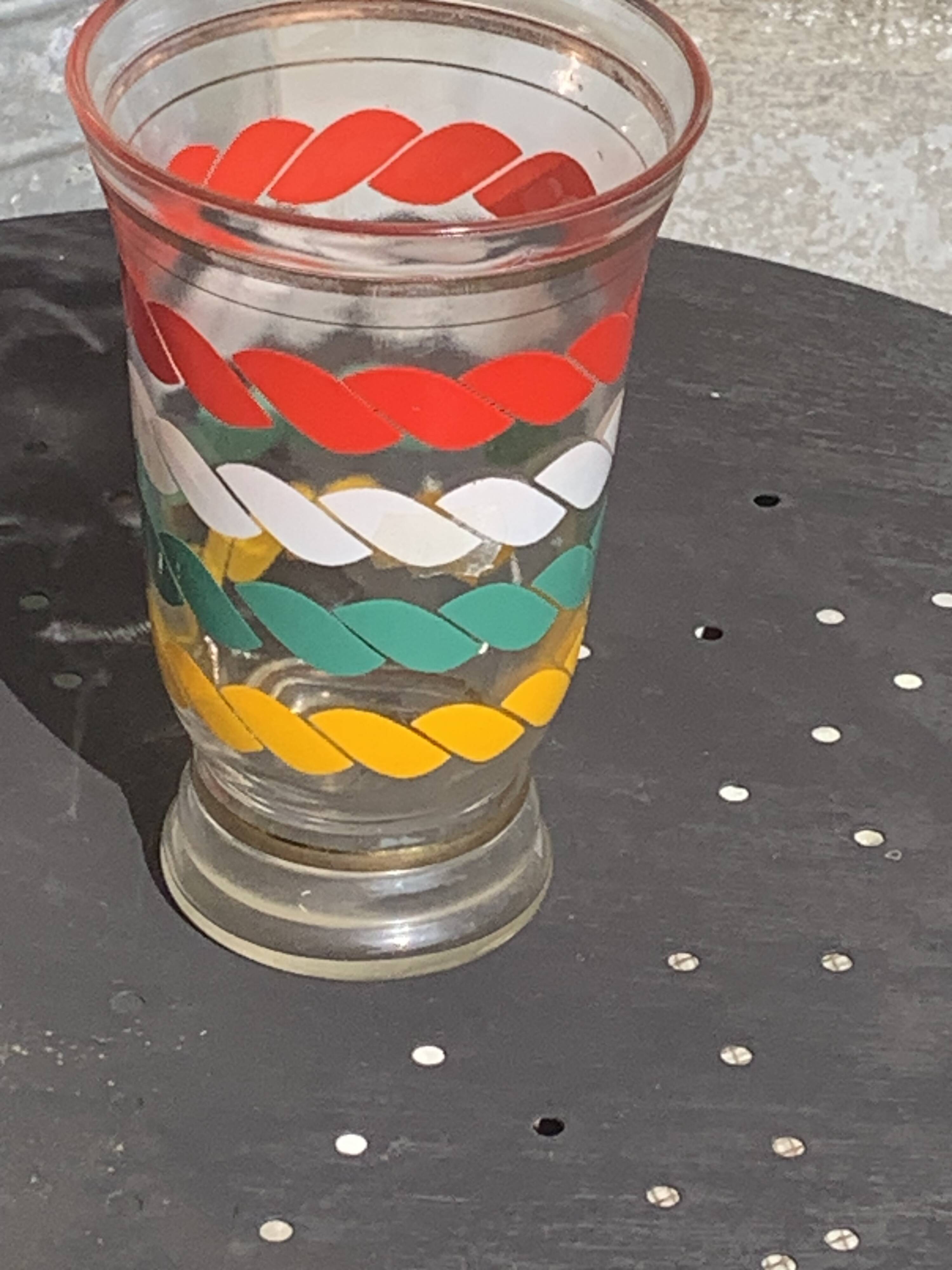 Transparent and gold glass vase and red, white, green and yellow silkscreen lines vintage 1960