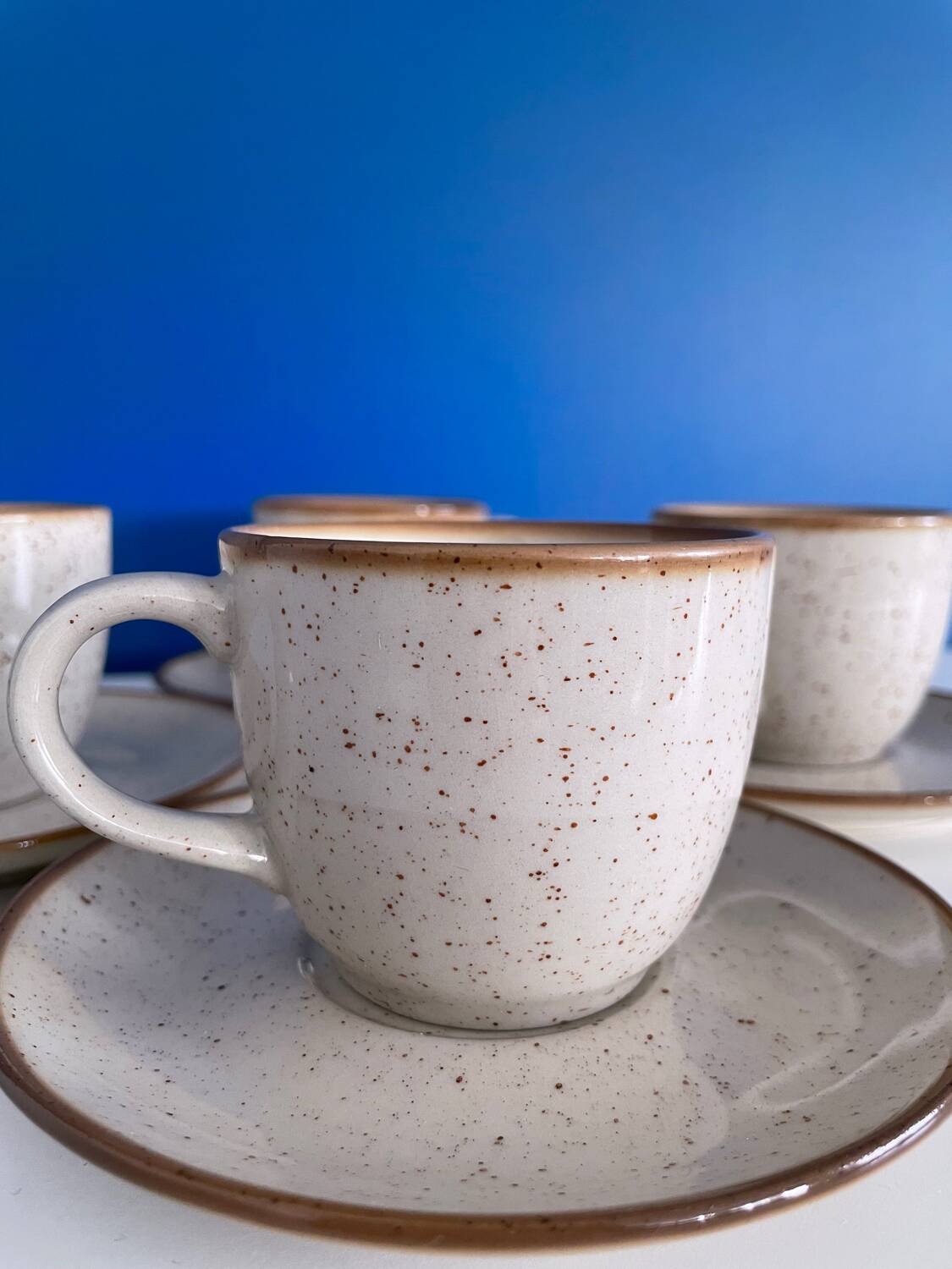 Speckled beige cup and saucer coffee set