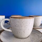 Speckled beige cup and saucer coffee set