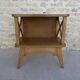 Light wood bedside table with crossbars, around 1960.