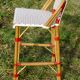 Vintage red and white rattan back bar stool 1970-80