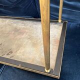 Black marble coffee table with brass legs.