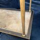 Black marble coffee table with brass legs.