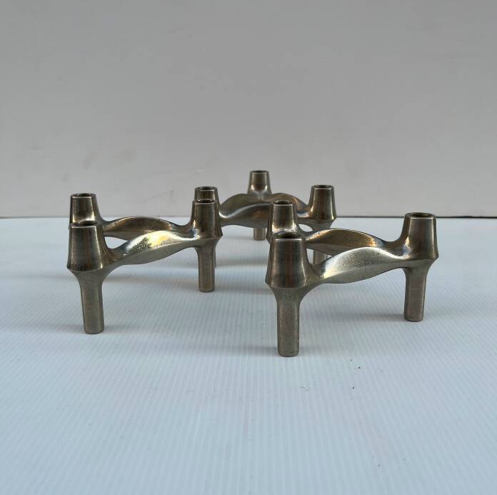 Vintage Stoffnagel candle holders in chrome steel