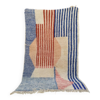 Tapis Béni Ouarain à rayures et motifs géométriques