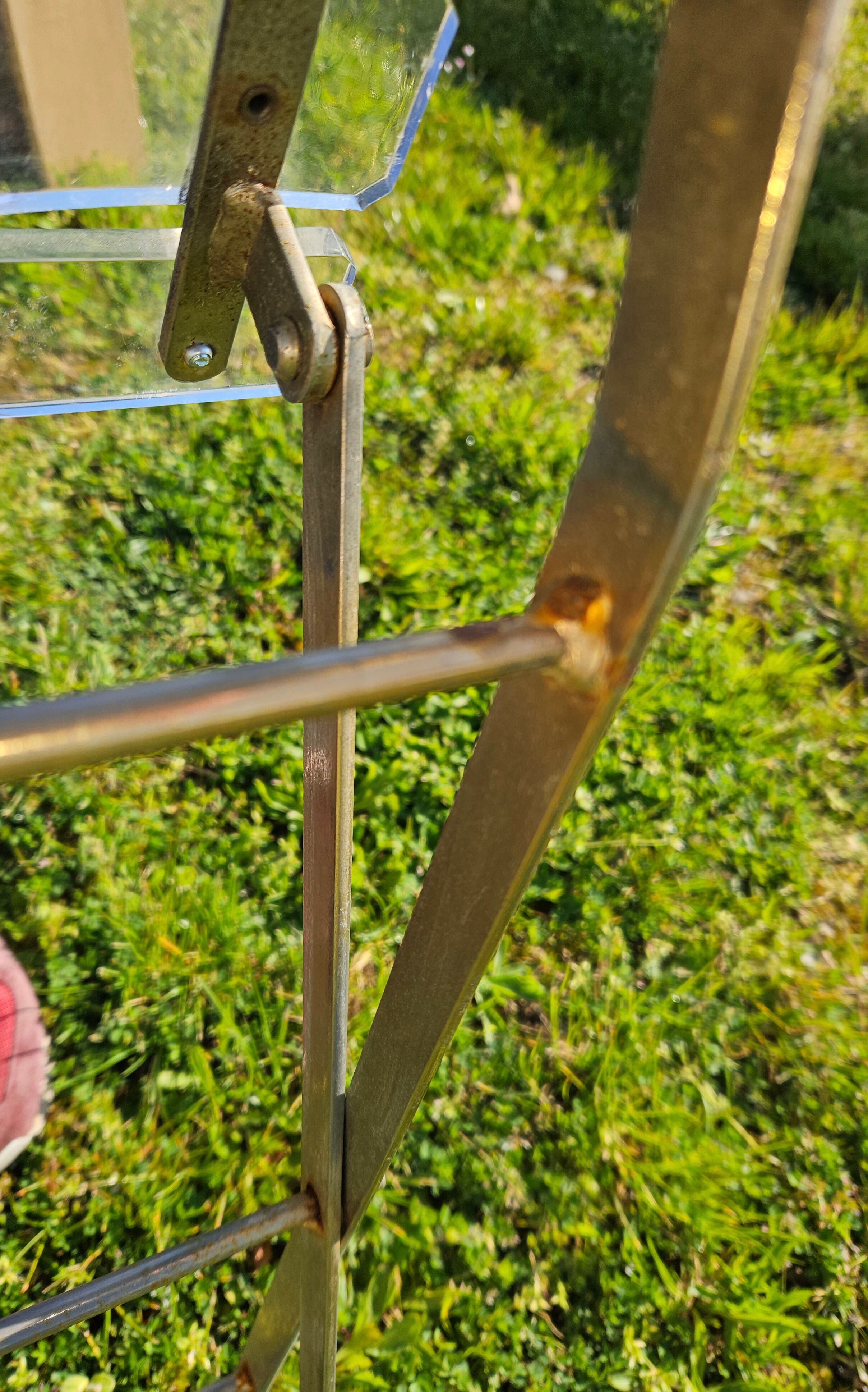2 invisible folding chairs in metal and transparent plexiglass