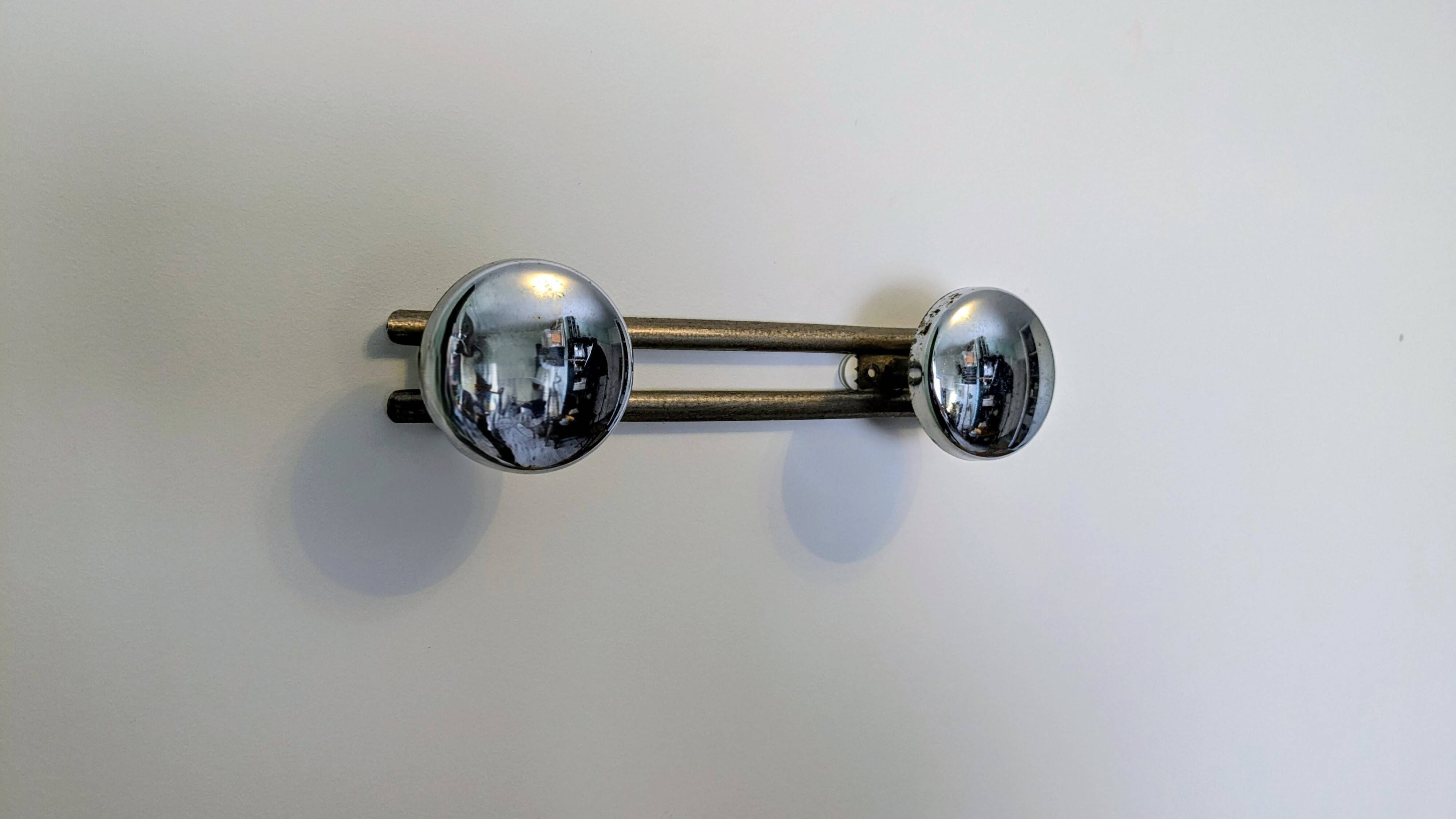 Double wall hook in chrome metal, vintage design.