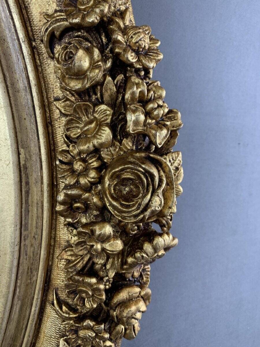 19th Century Gilded Mirror with Floral Motifs