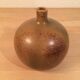 Sandstone ball vase signed Michel Dumont