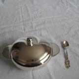 silver metal sugar and silver sugar spoon.