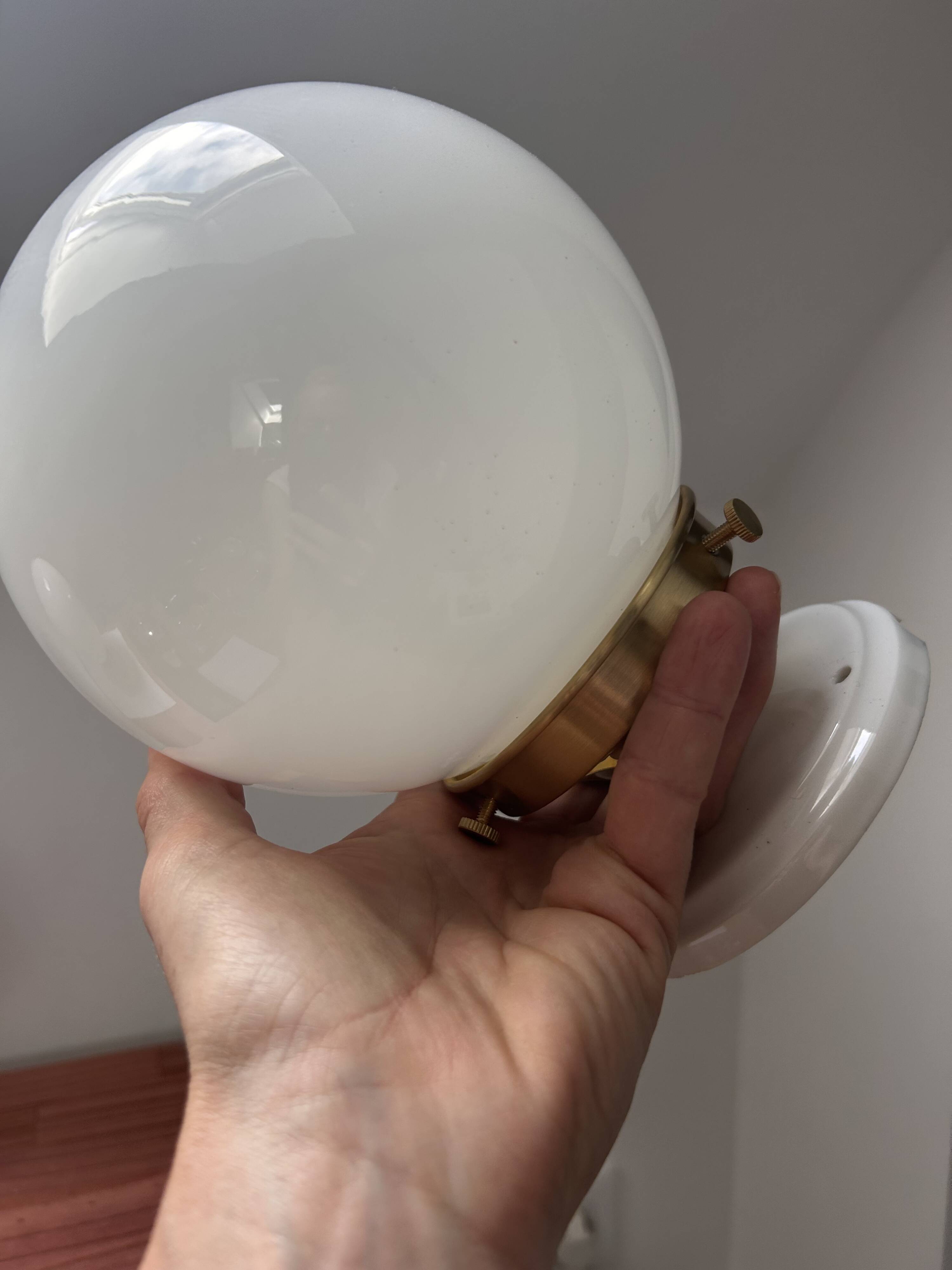 Set of two white opaline ball wall lights