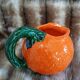 Jug / Carafe in orange barbotine shape