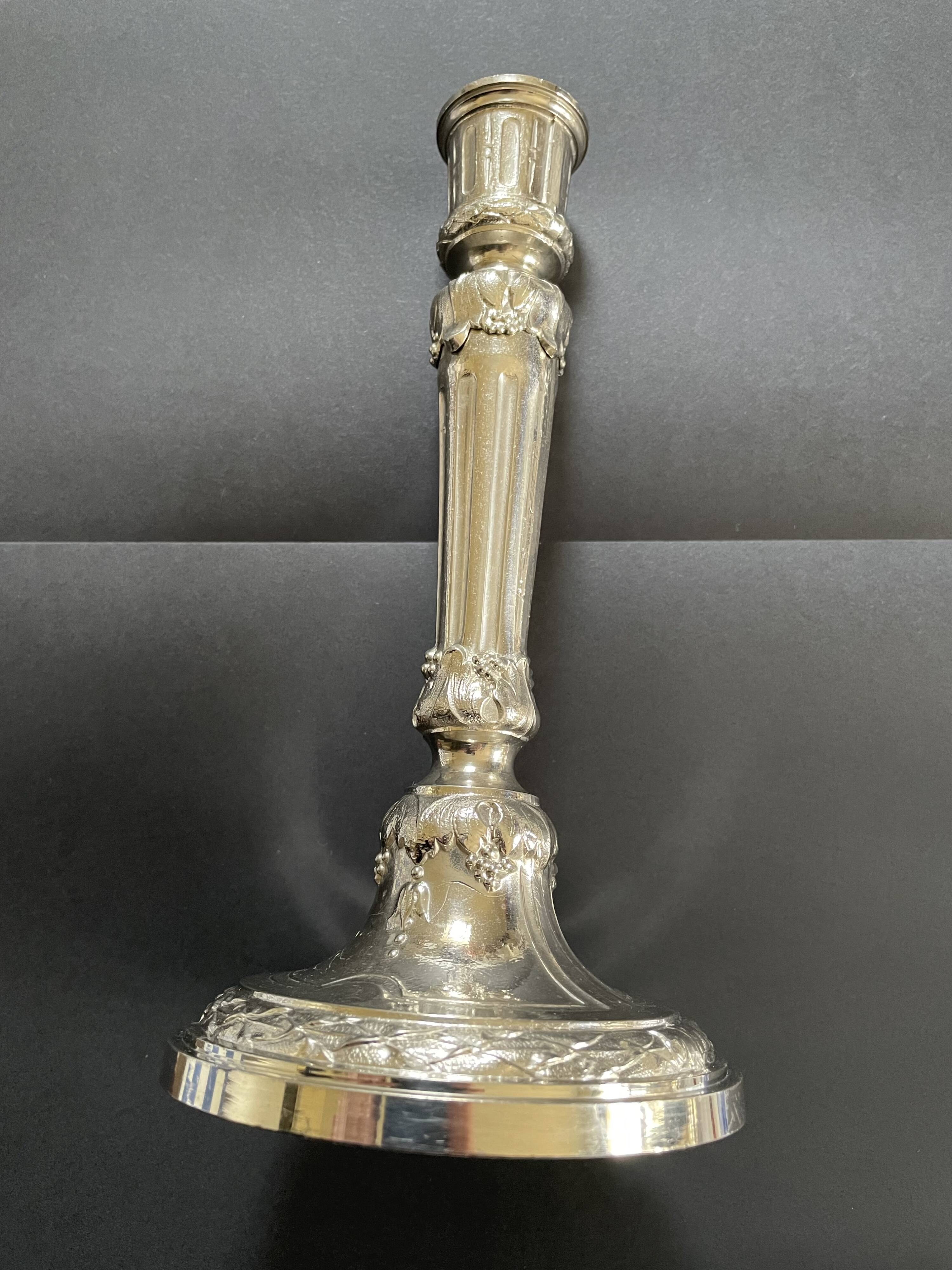 Antique silver-plated candlesticks in classic style