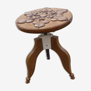 Walnut screw stool carved with fleurs-de-lys