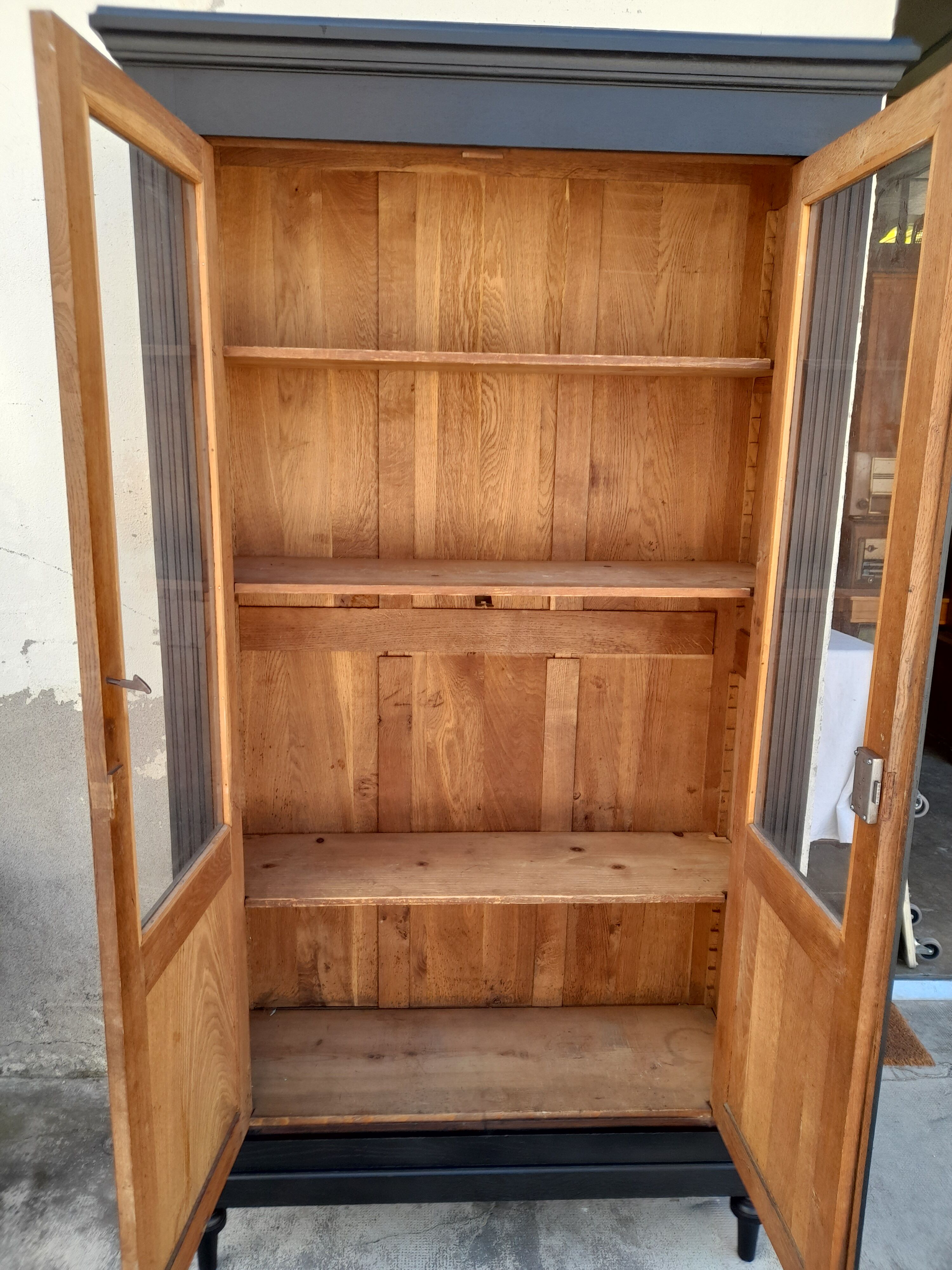 Parisian showcase in black patinated oak