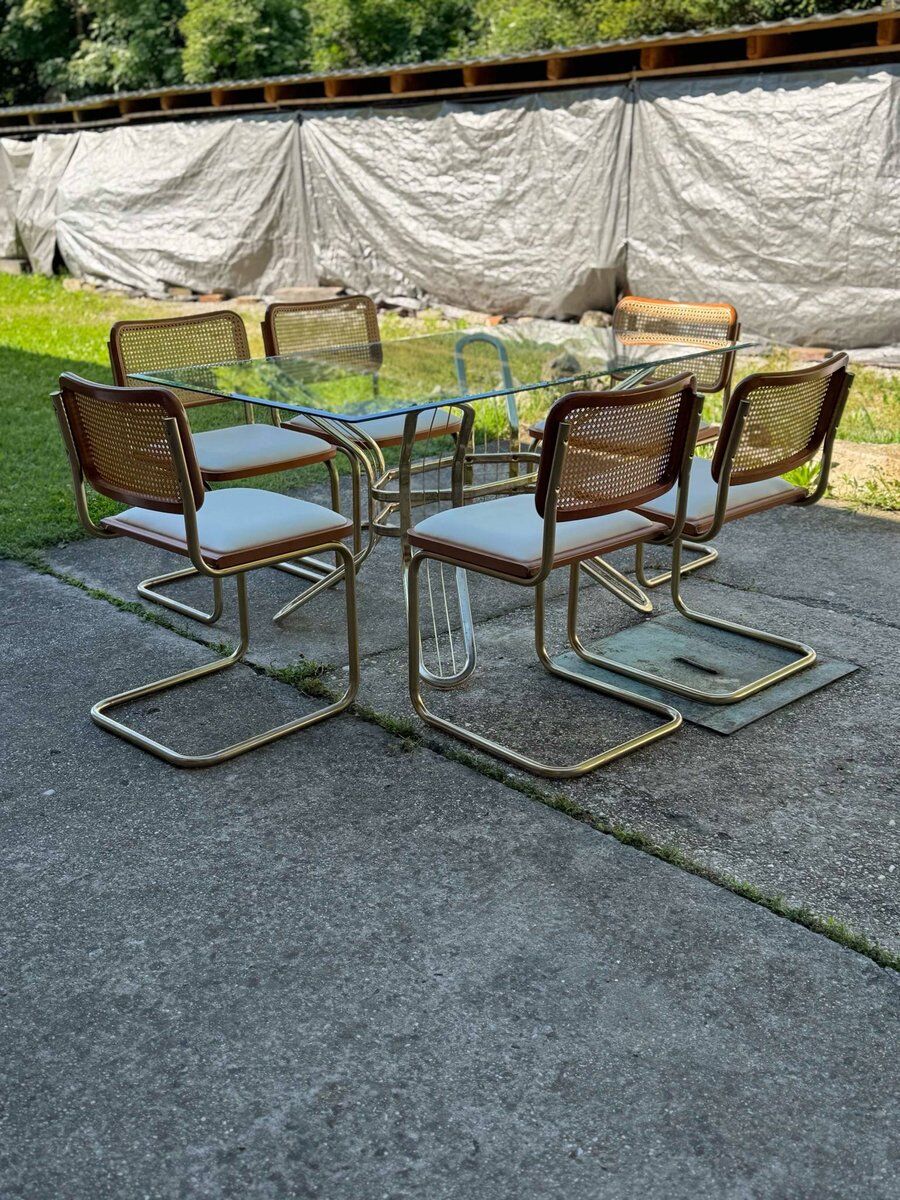 Italian brass dining set with table and chairs, 1970s, set of 9