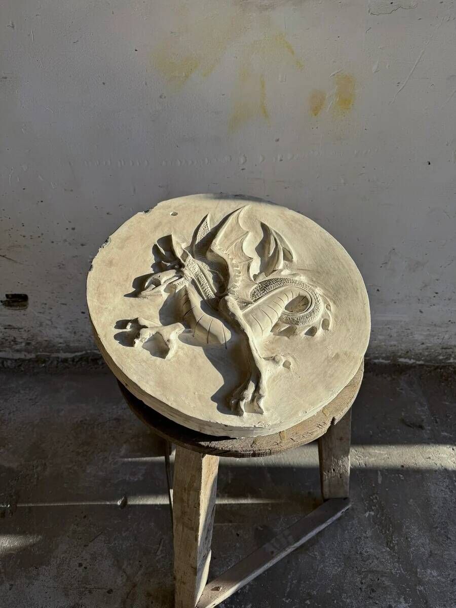 Plaster dragon by Walter De Buck