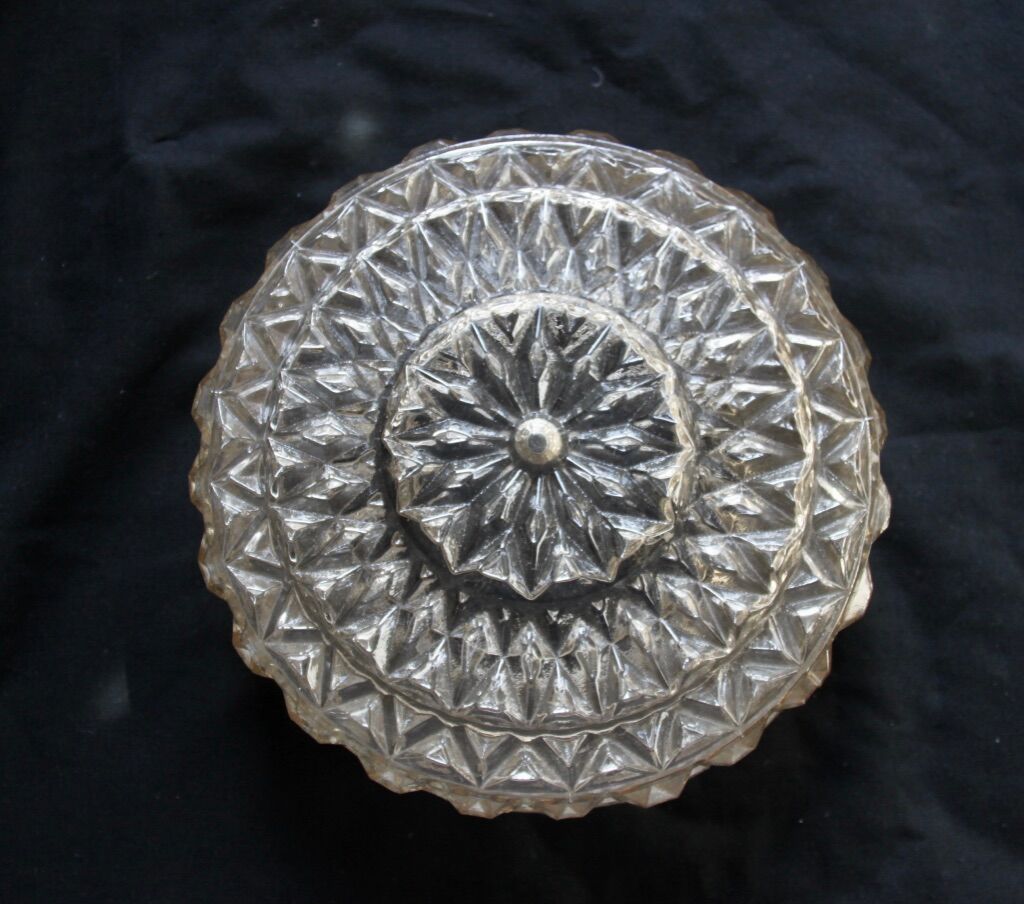 Round ceiling light made of transparent amber glass