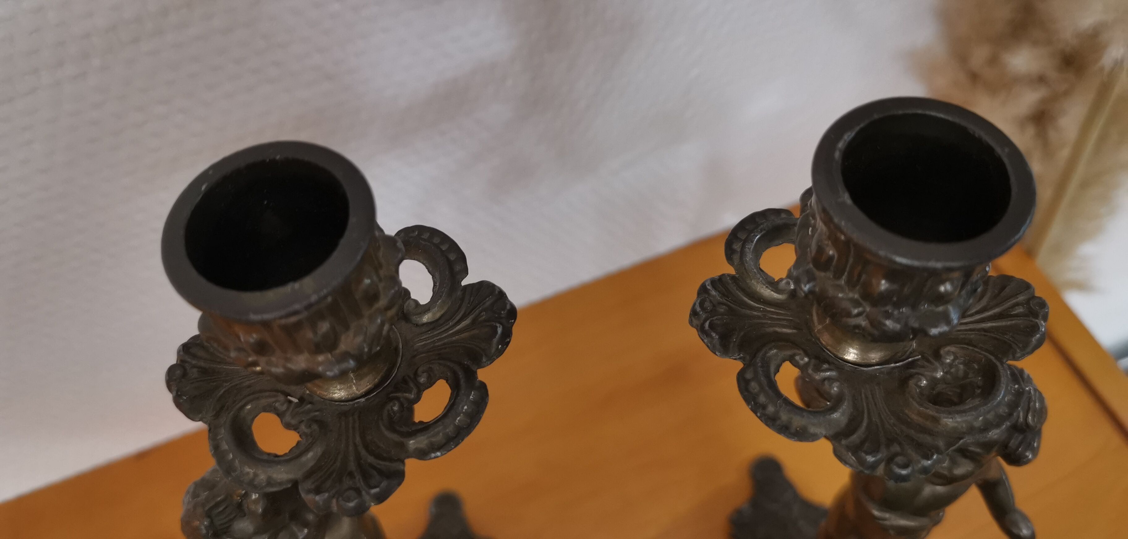 Pair of antique candlesticks in bronze and brass