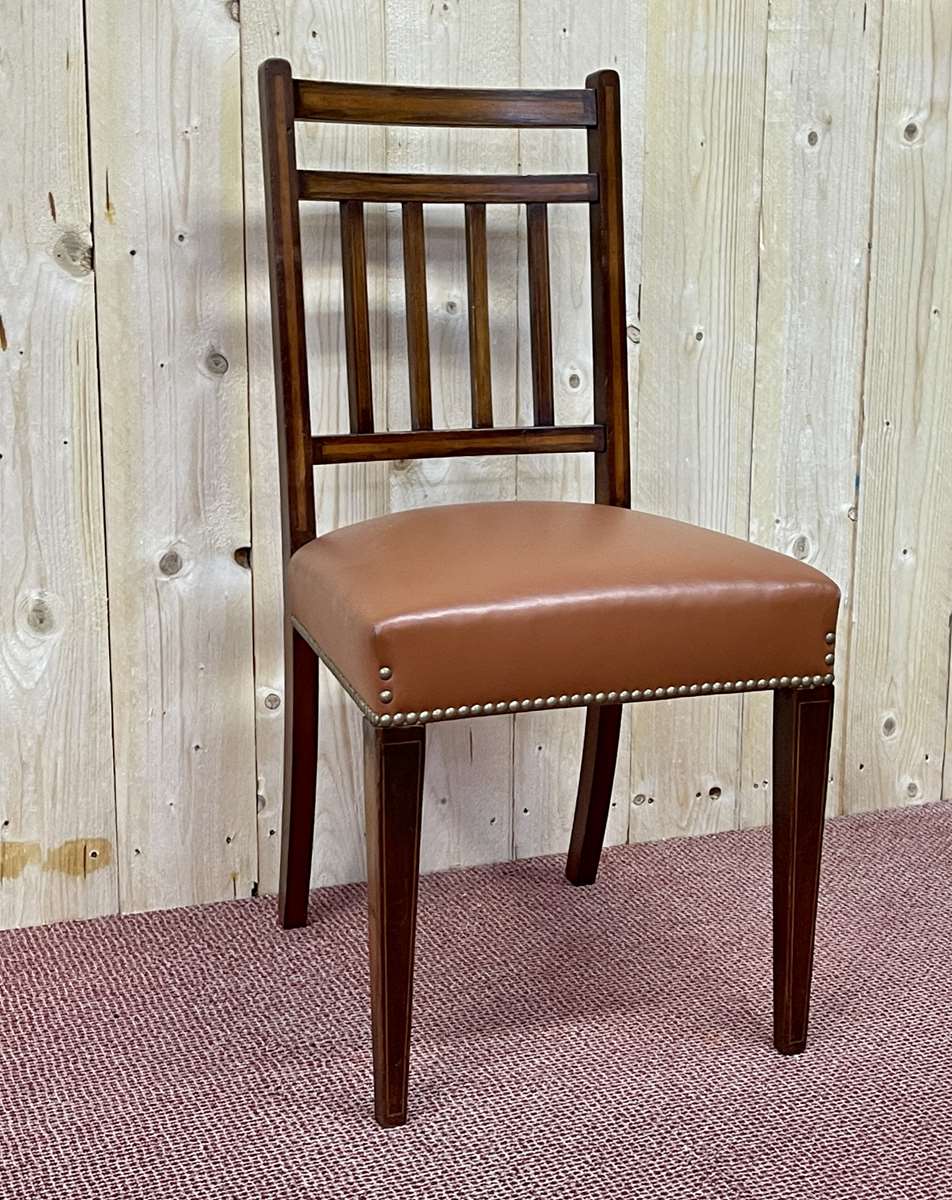 Suite of 12 English chairs nineteenth in mahogany and imitation leather