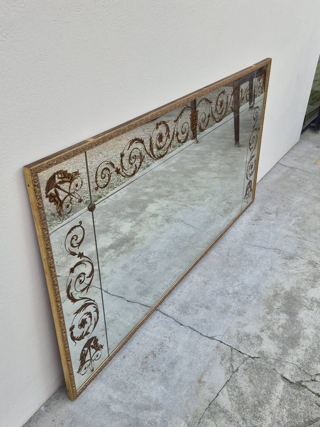Antique gilded Venetian brasserie mirror in eglomised glass