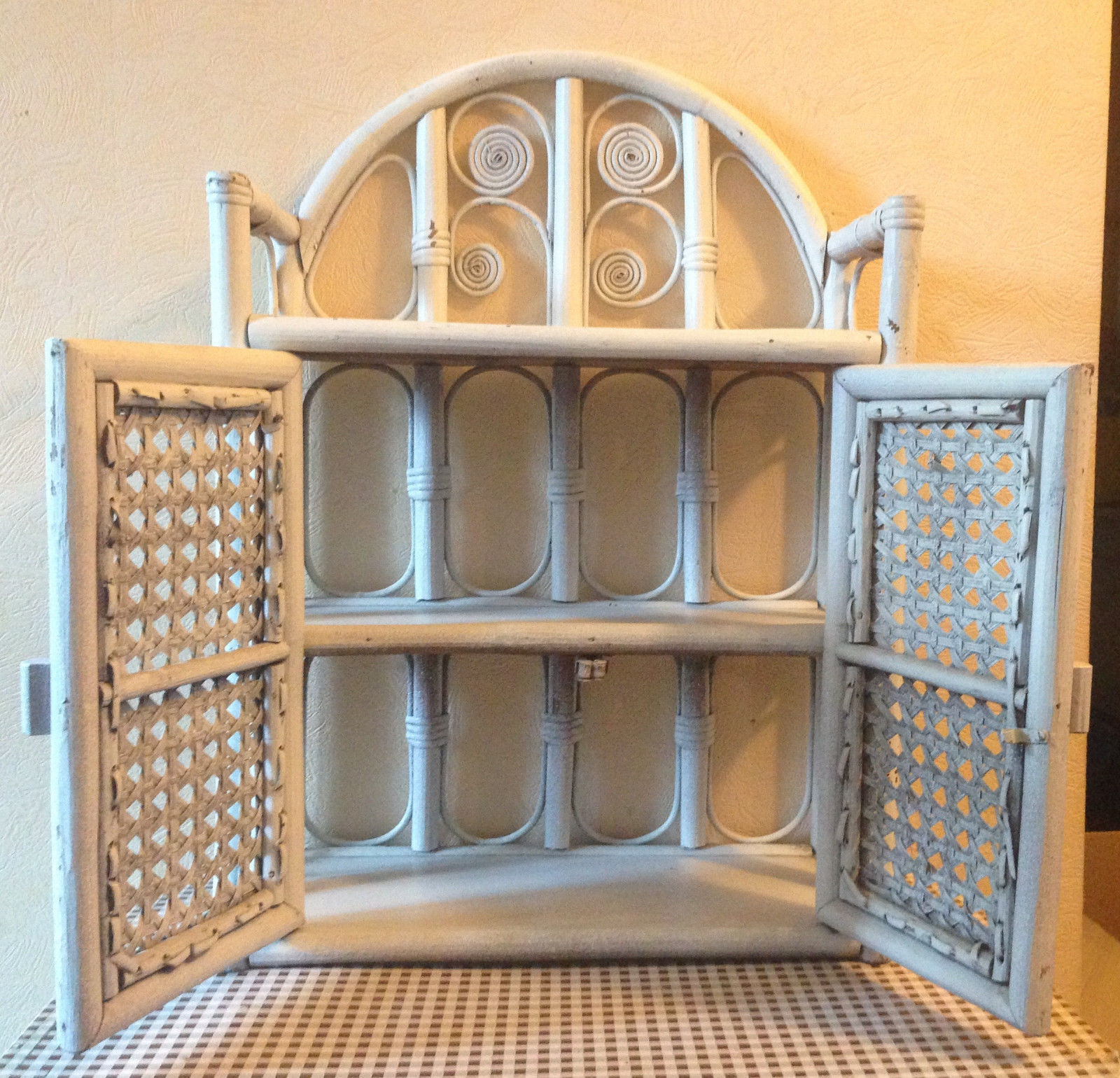 White rattan wall shelf
