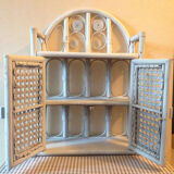 White rattan wall shelf
