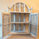 White rattan wall shelf