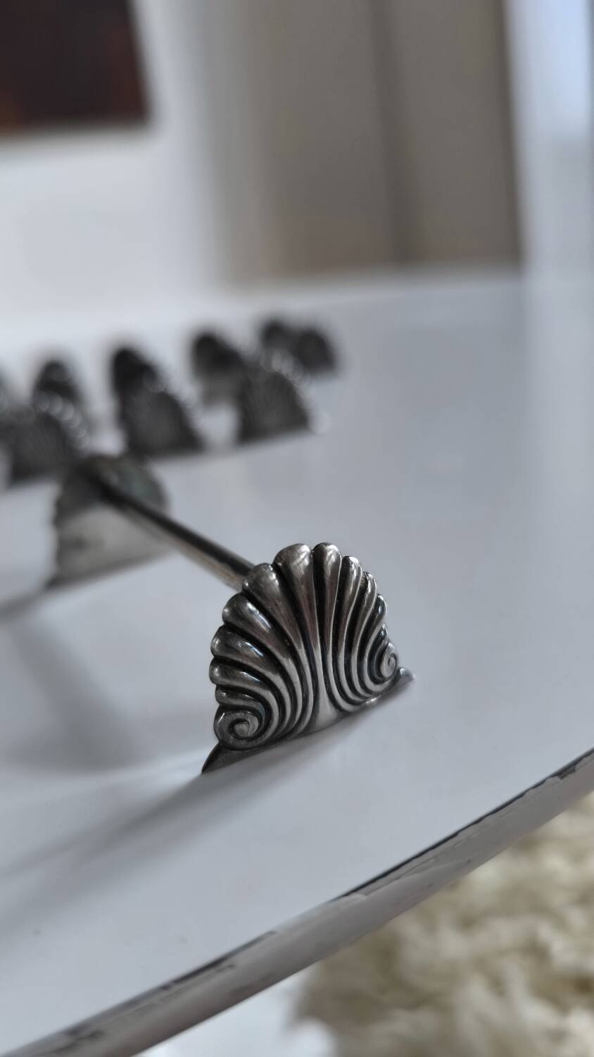 Set of 12 solid silver knife holders