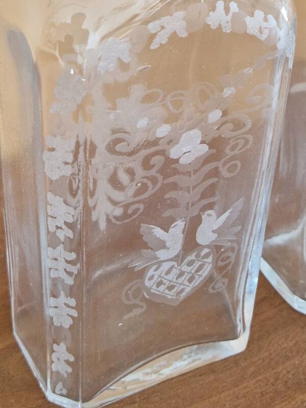 Pair of old engraved and frosted glass bottle vases.