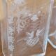 Pair of old engraved and frosted glass bottle vases.