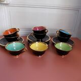 set of 9 black and gold Salins cups and saucers