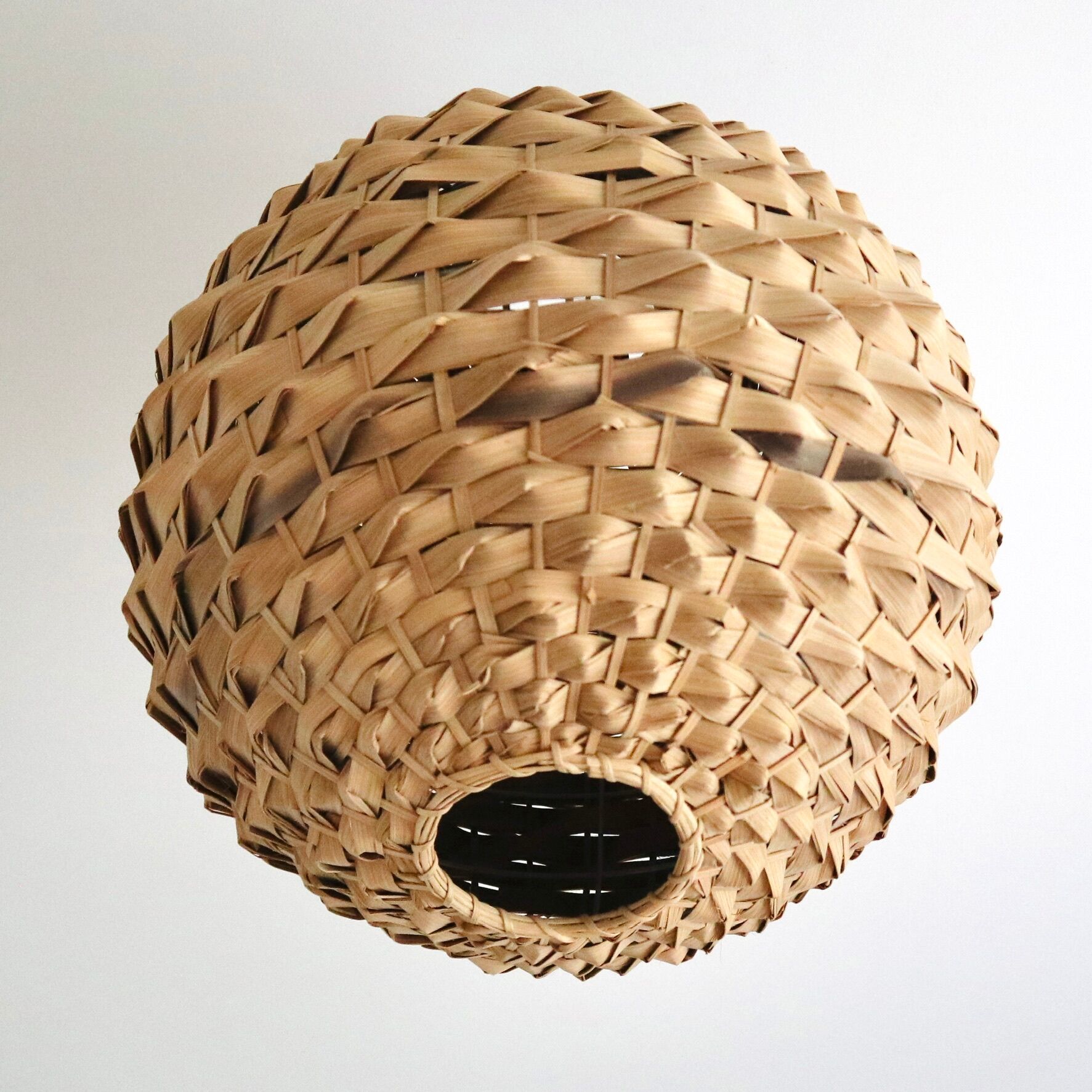 Braided palm ball suspension