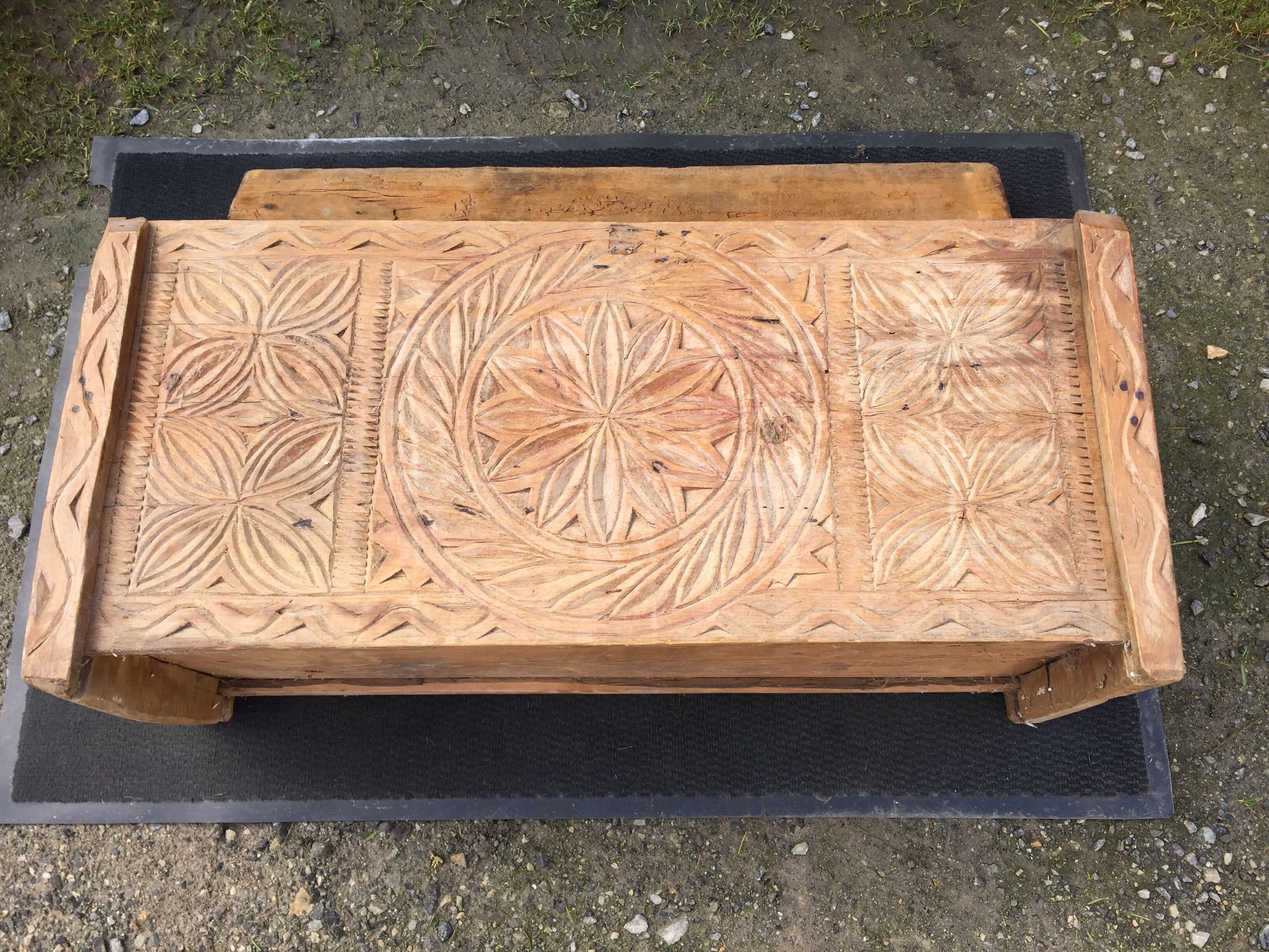 Ancient brutalist chest carved wind rose