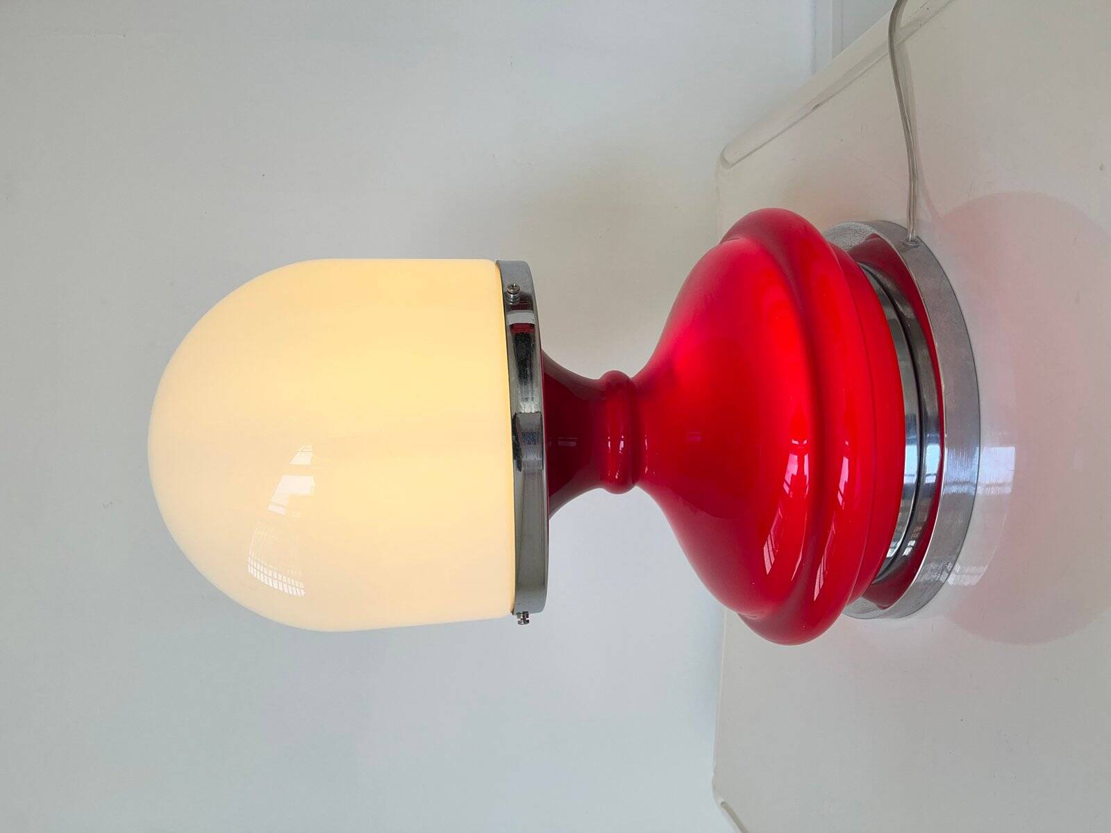 Red plastic table lamp