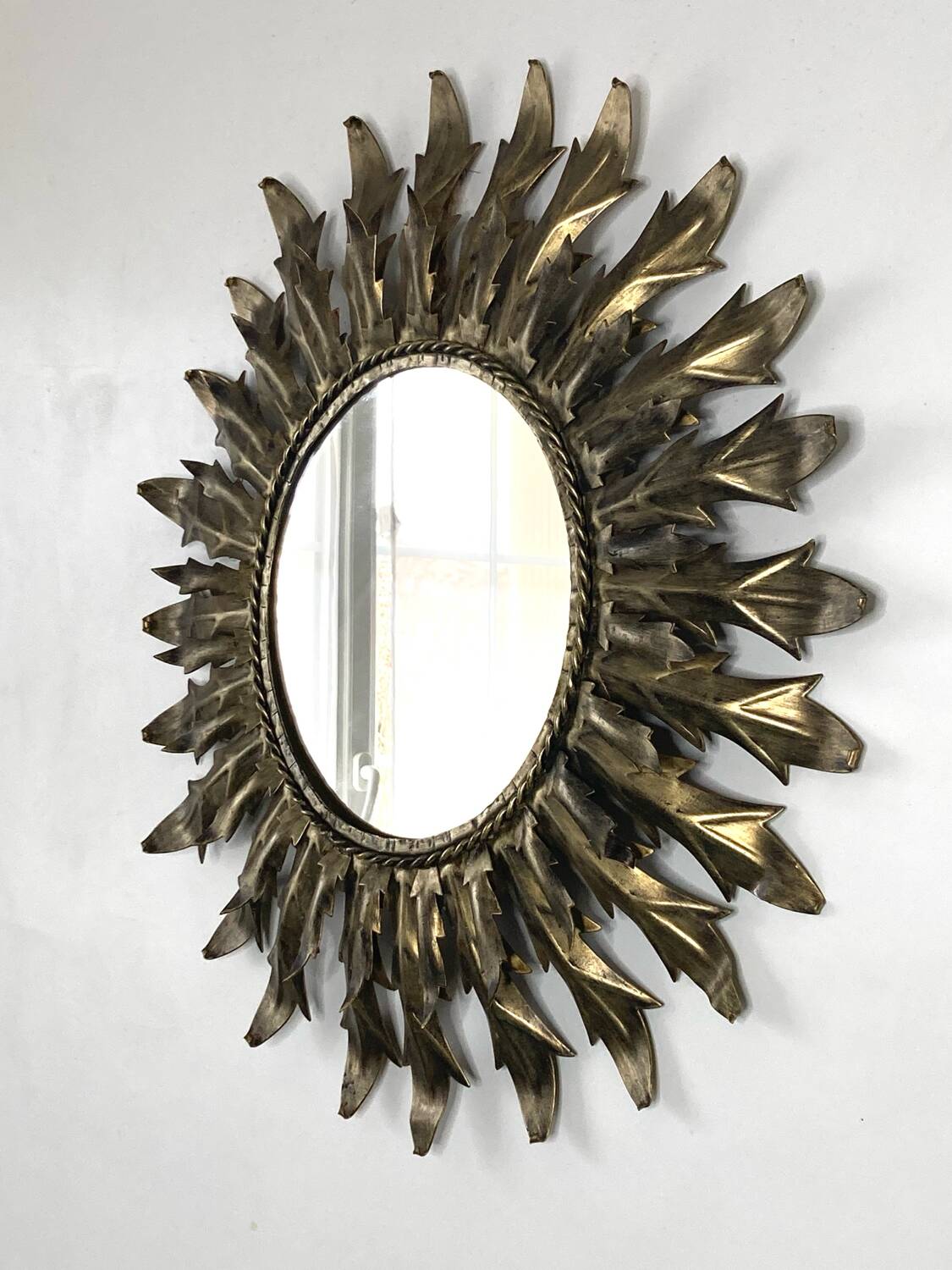 Gold metal sun mirror