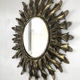 Miroir soleil métal doré