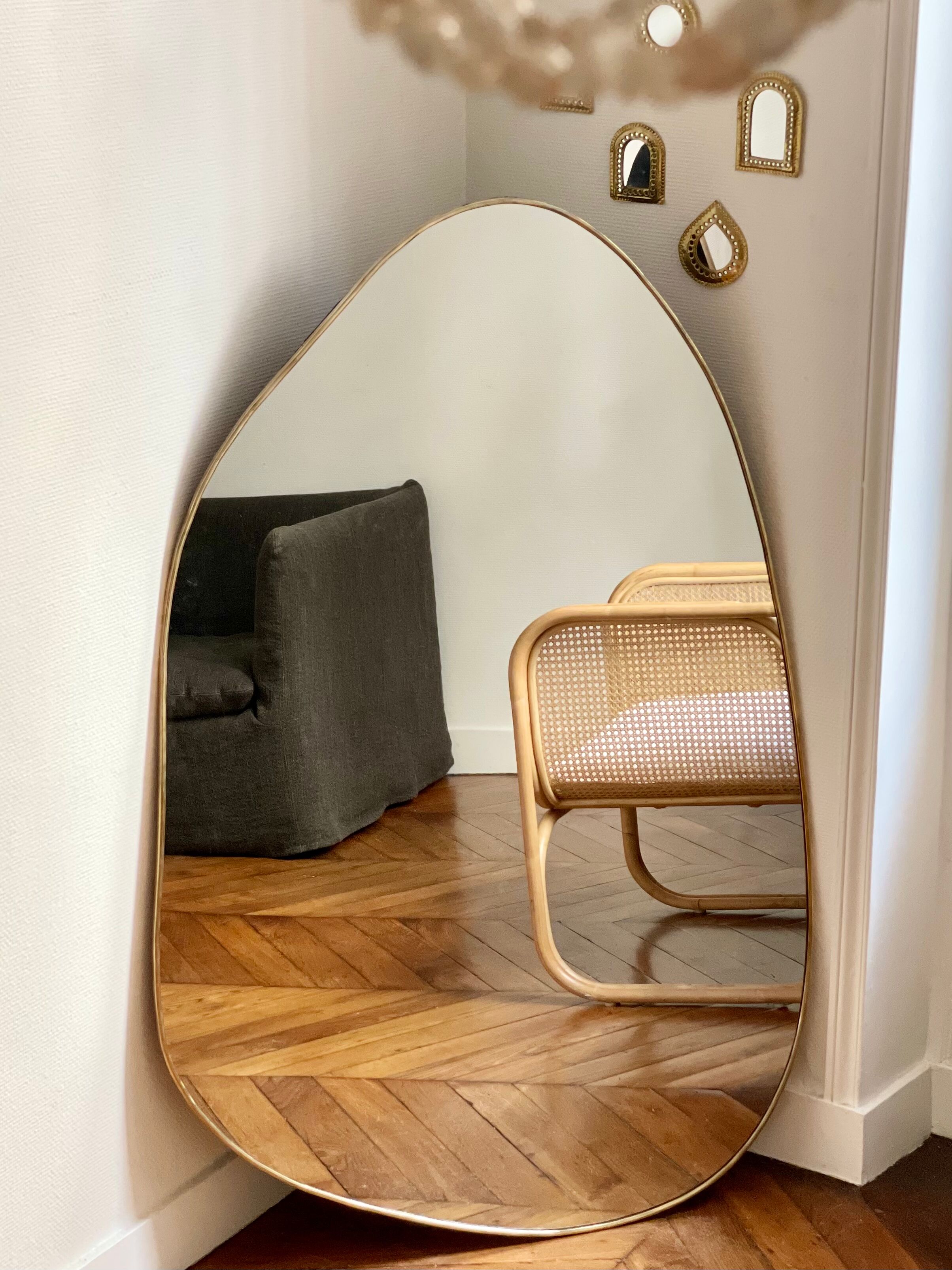 Minimalist organic brass trapeze mirror