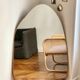Minimalist organic brass trapeze mirror
