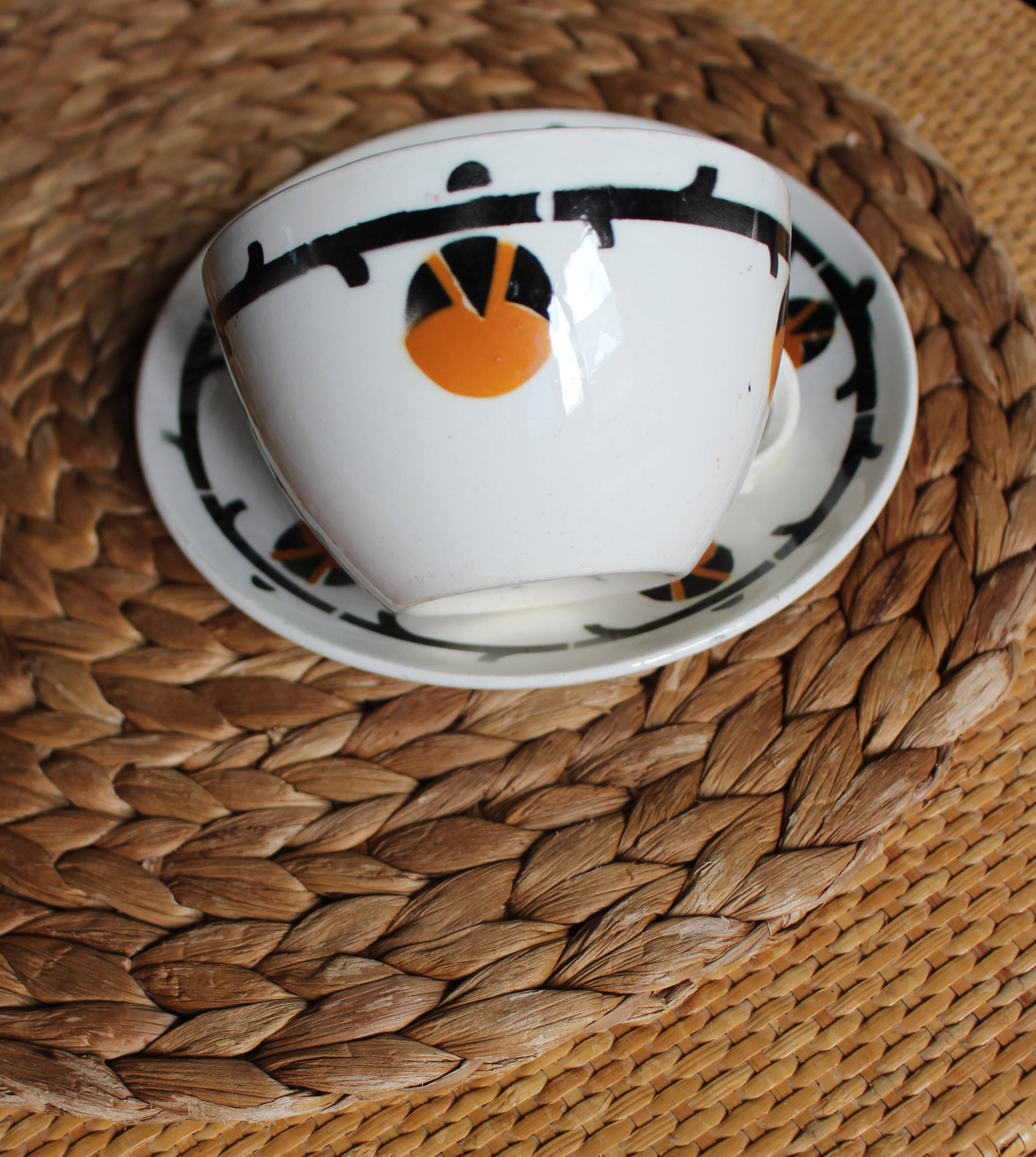 A large cup of chocolate tea, saucer Badonviller Barcarolle orange black.