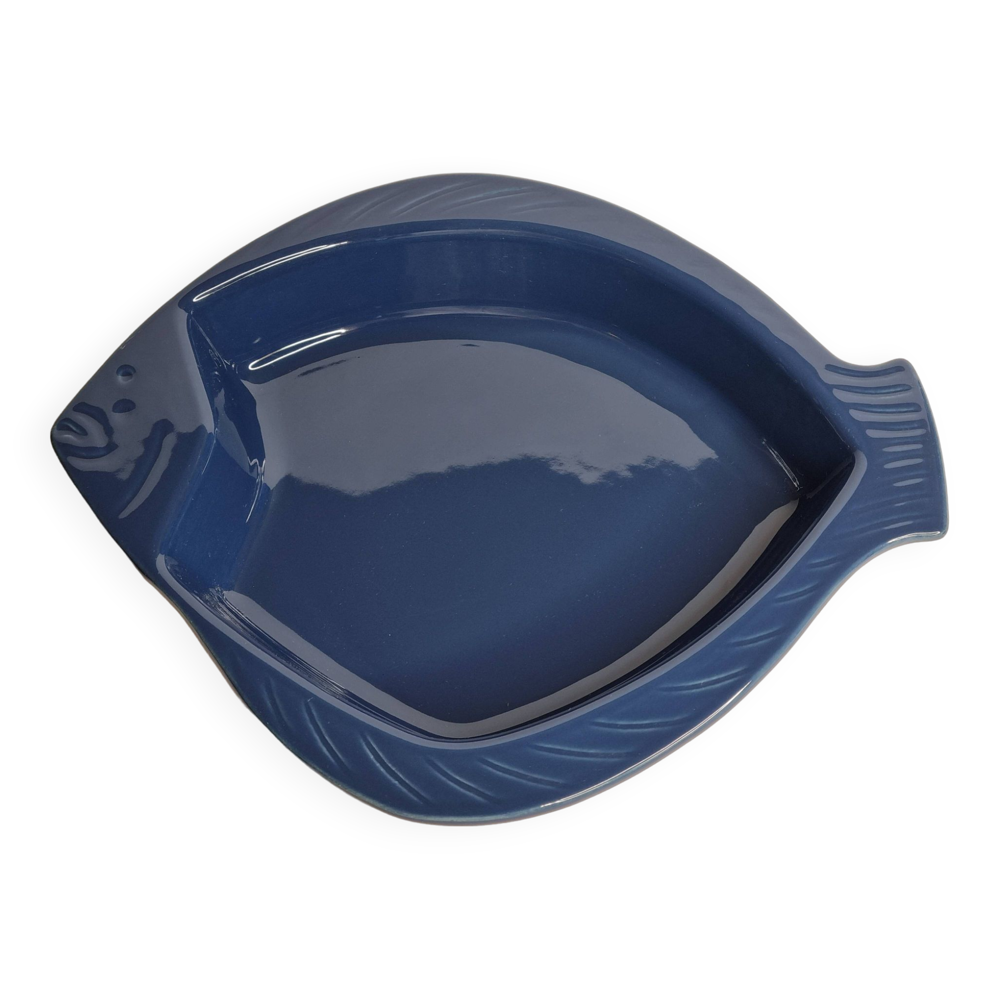 Blue ceramic serving dish in the shape of a fish signed Émile Henry