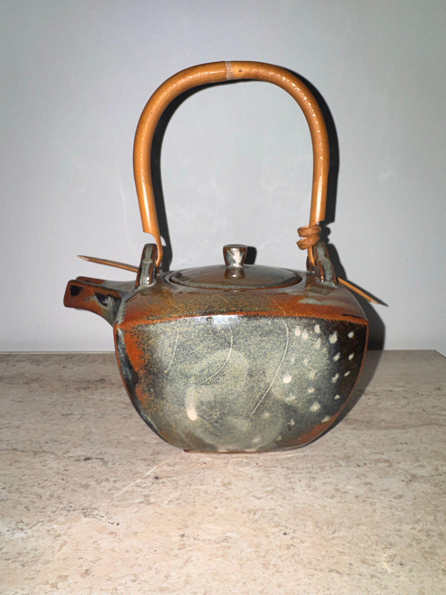 Ceramic teapots with bamboo handles by Elisabeth Wallet