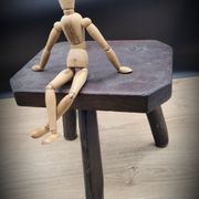 Dark octagon tripod stool