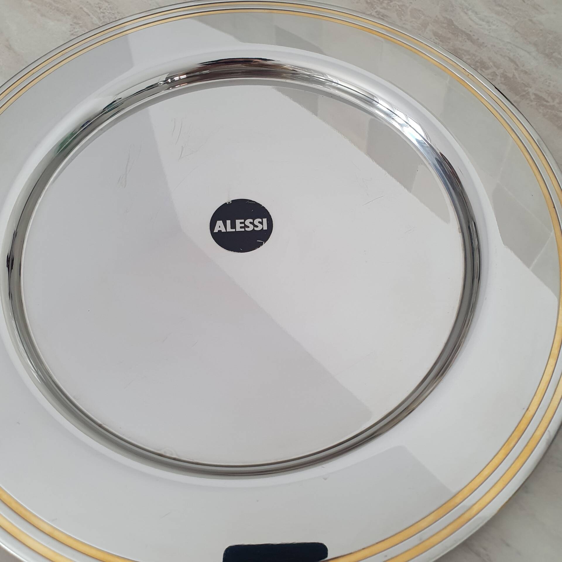 Alessi Ettore Sottsass / Assiette de service inox 18/10 et doré NG5100