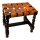 Antique turned wooden stool with woven leather.