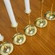 Set of 7 Scandinavian brass candle holders, 1960's