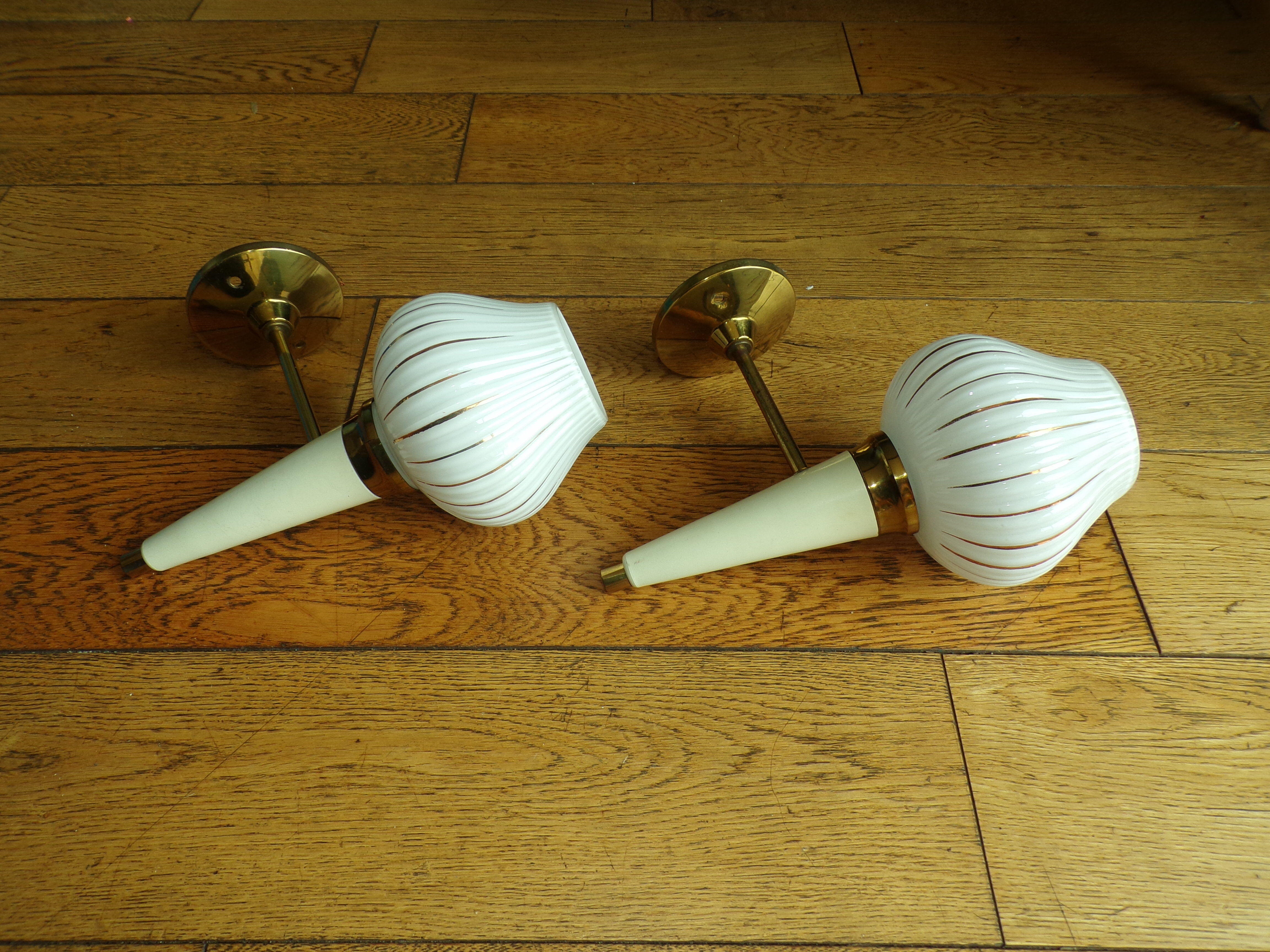Pair of modernist torch wall light