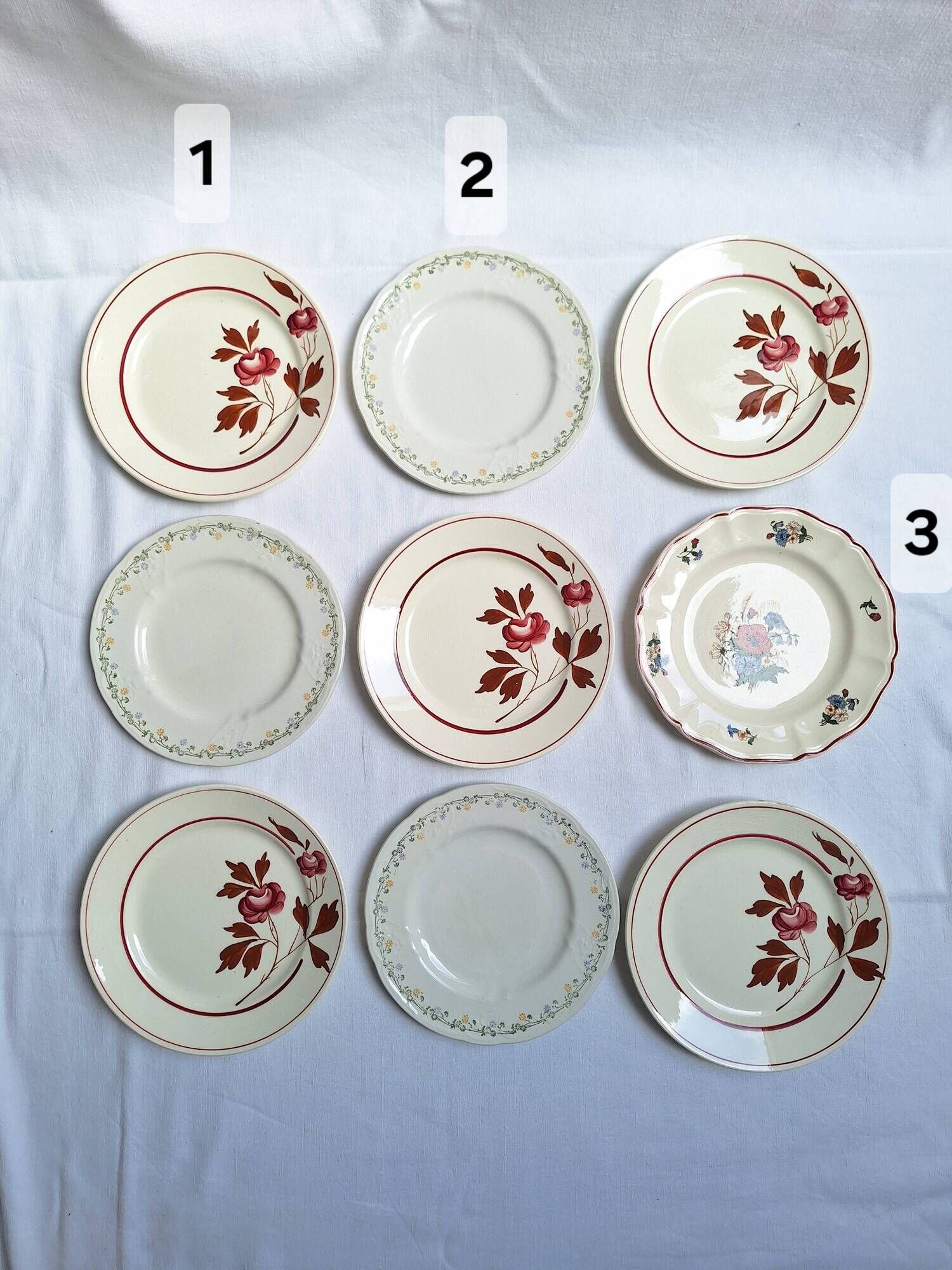 Vintage flower dessert plates from Sarreguemines, Longwy, and Lunéville.