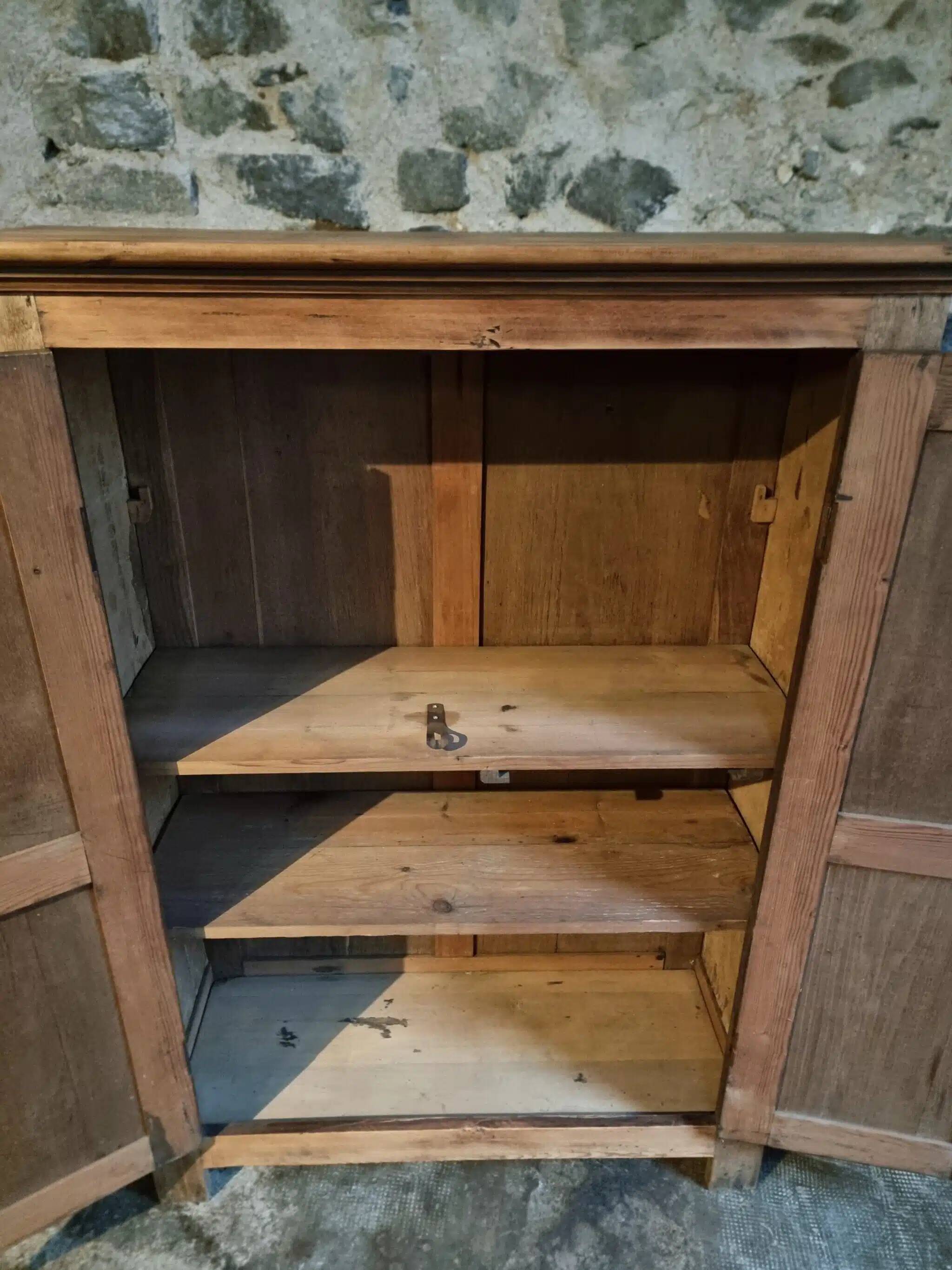 Antique French wardrobe in oak and pine, late 19th century.