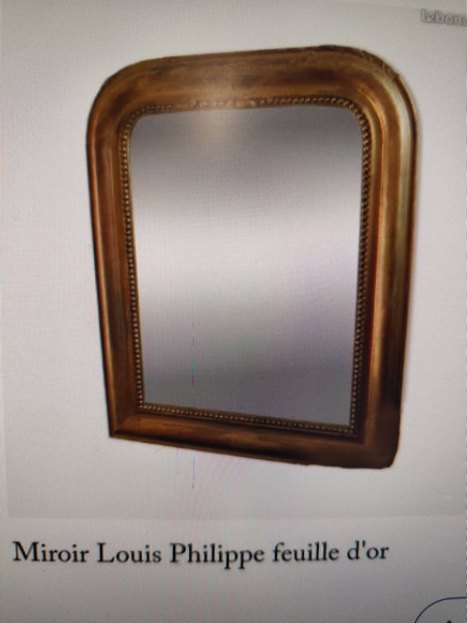 Antique Louis Philippe mirror, 19th century, mercury backing, wooden parquet back.